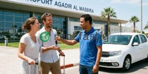 RentFastly agent Abderrahim handing car keys to happy tourists Agadir airport